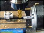 5. Drive pulley drilled and tapped in 2 positions and servo shaft with shaft flat machined.jpg